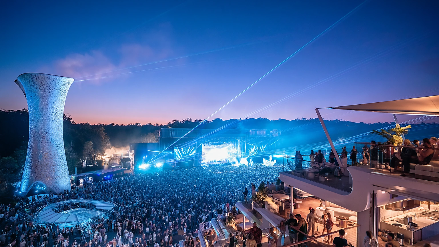 Premium festival environment with immersive lighting and elevated guest atmosphere