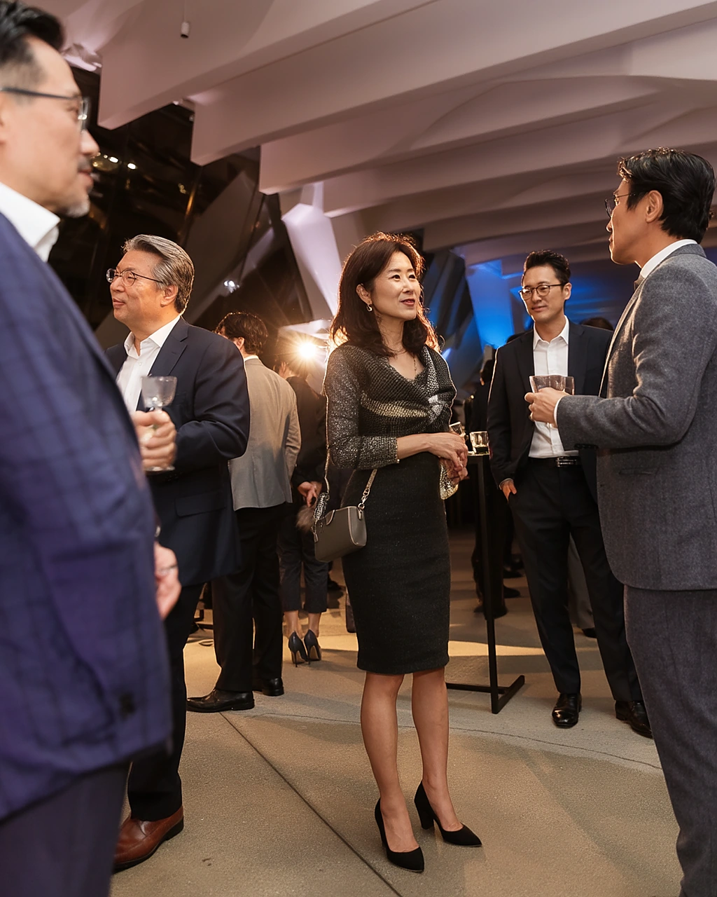 Executive guests networking at a premium brand showcase reception in downtown Los Angeles